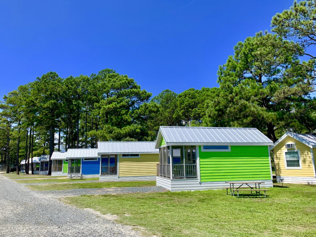 KOA Camping cabin with picnic table
