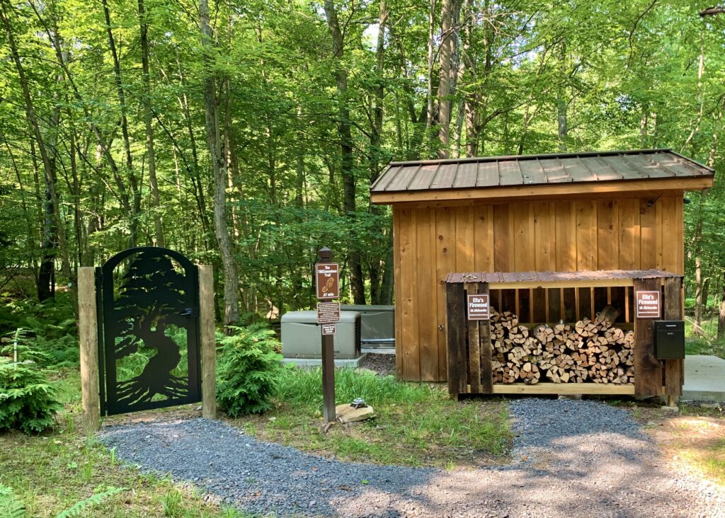 Firewood and Trail Entrance